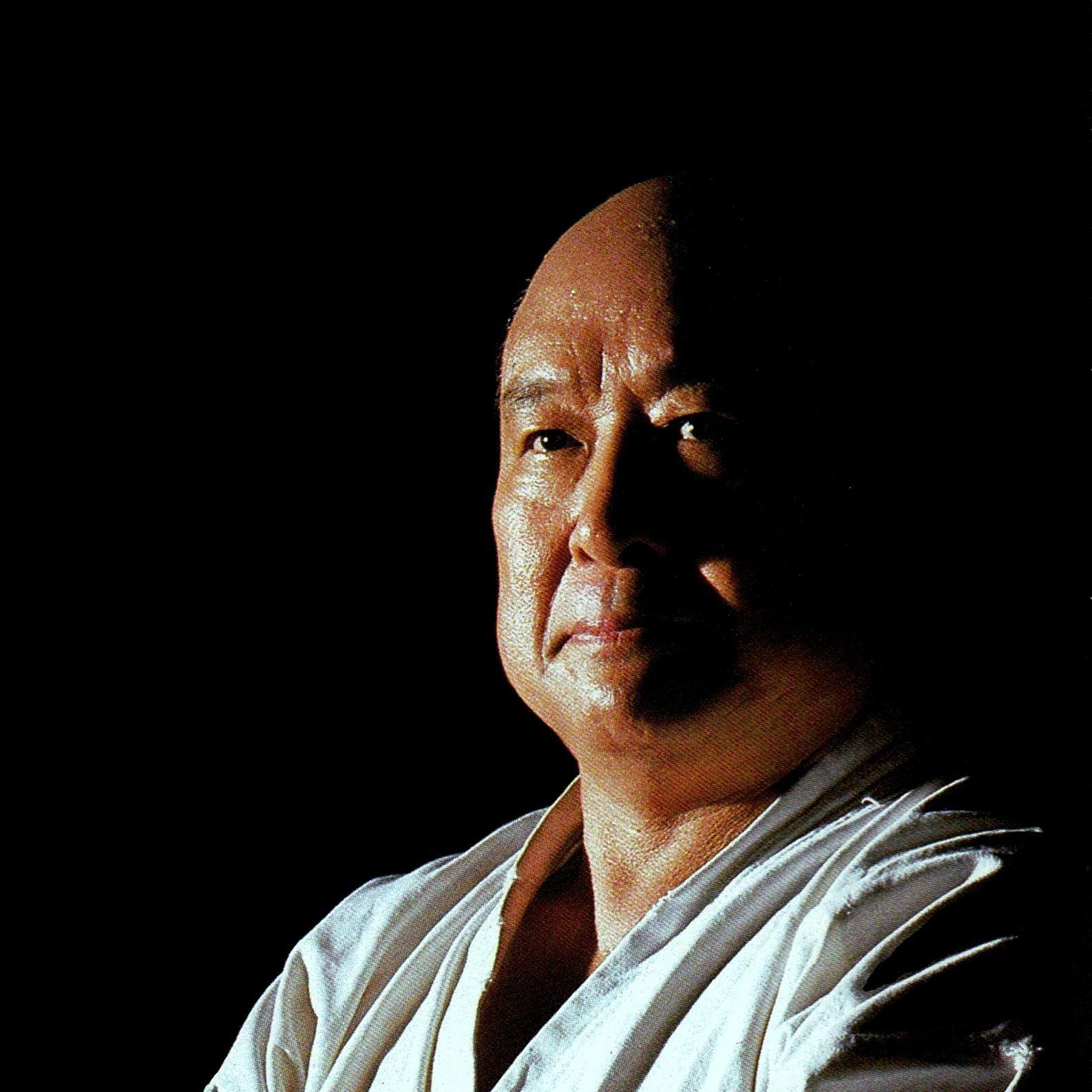 A portrait of a man looking like a wise man, the founder of the Kyokushinkai Karate